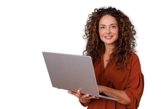 Professional woman with curly hair holding a laptop and smiling, embracing technology and business innovation, transparent background