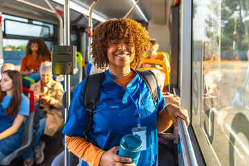 Smiling nurse commuting by public transport bus © unai