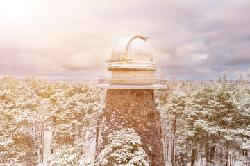 Old observatory tower in the Glen park. Tallinn, Estonia, against dramatic sky