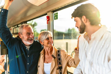 Family generations traveling together on public transport bus