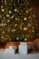 Naklejka premium christmas decorative gifts toys and fire in background holiday concept