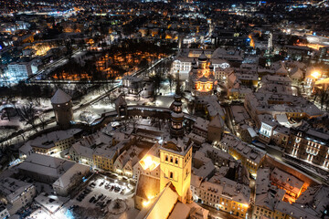Aerial night View of Tallinn in winter with Alexander Nevsky Cathedral, roofs with snow, Christmas mood