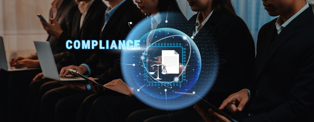 A professional team engaged in a business meeting focused on compliance, featuring technology presentations and legal symbols in a modern corporate office environment. Trope