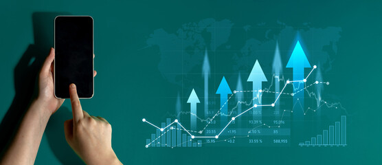 A person interacts with a smartphone against a green background, showcasing financial graphs and upward arrows that symbolize growth and investment success. Scalp