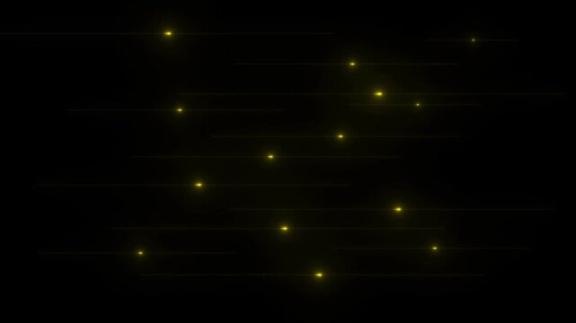 Yellow glowing light streaks moving horizontally across a dark black background with bokeh effects abstract