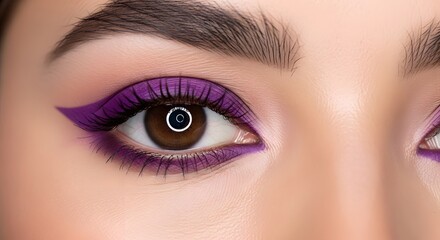 Close up of a woman s eye with vibrant purple eyeshadow and eyeliner. International Women's Day 