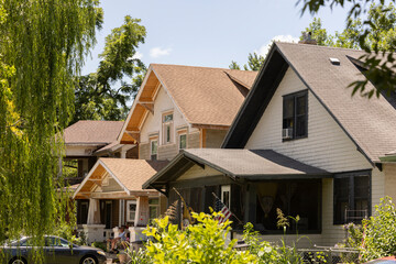 Afternoon sun shines on historic homes in downtown Emporia, Kansas, USA.