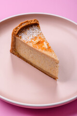 Cheesecake, a slice of sweet pie, a classic cheese dessert. Cheesecake as a food background