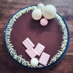 Modern chocolate mirror glaze celebration cake