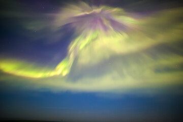 Display of the Aurora Borealis, Northern Lights, off the North East Coast of Iceland, sailing into the Arctic Circle. 