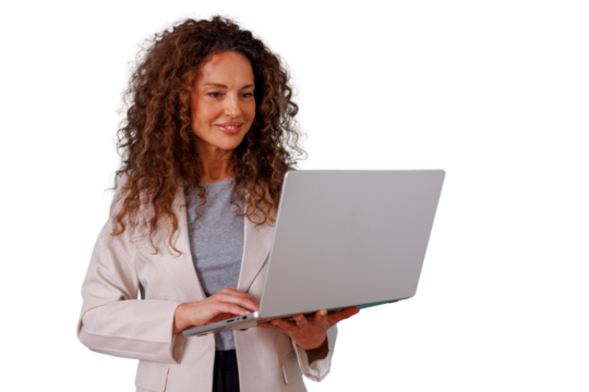 Businesswoman with curly hair smiling and standing, working on laptop, managing business, looking at screen, transparent background