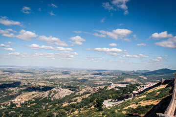 Obraz premium Village Beneath the Ridge