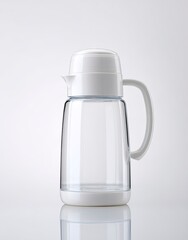Clear glass pitcher with white plastic lid and handle