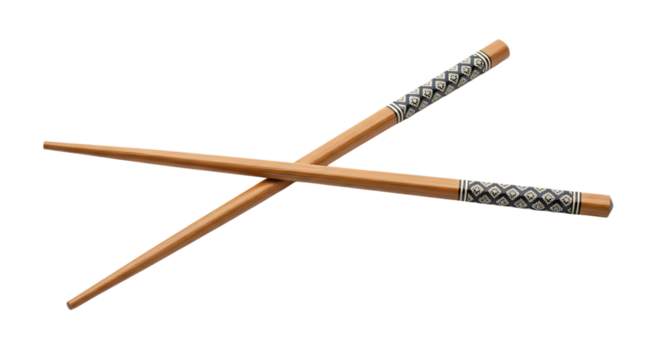 Two wooden chopsticks, with decorative bands crossed on a plain background, isolated on transparent background. PNG