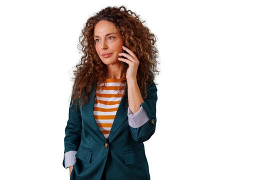 Woman with curly hair making a call on a phone, communicating and connecting, business casual professional