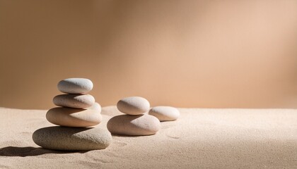 zen inspired composition of smooth river stones arranged vertically on sand background with soft pastel lighting and ample copy space