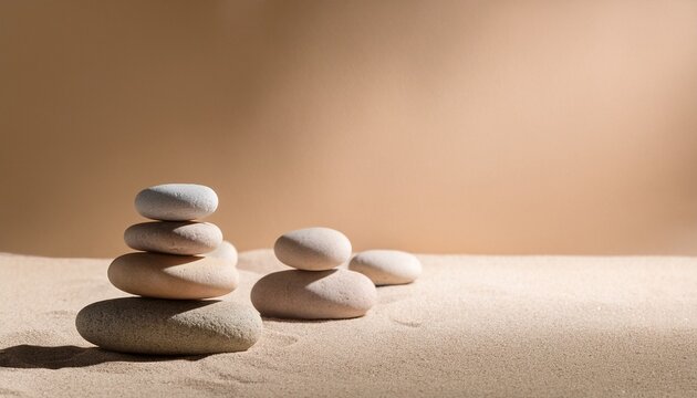 zen inspired composition of smooth river stones arranged vertically on sand background with soft pastel lighting and ample copy space