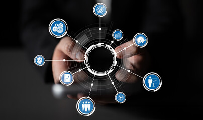 A conceptual image showcasing hands holding a digital interface with various icons representing data analysis, growth metrics, and business insights, symbolizing modern enterprise strategies. Crux