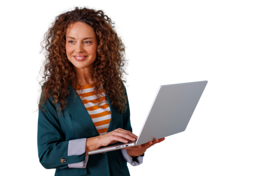 Professional woman with curly hair smiling and using a laptop, standing with a transparent background