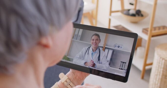 Senior aged mature grey haired woman talking with doctor by video call, using medical apps on laptop tablet, service, nurse consulting mature senior patient online, modern healthcare treatment