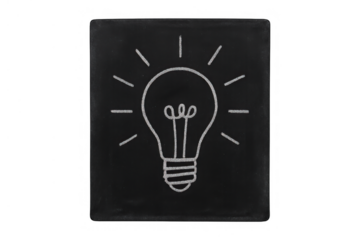 Light bulb drawing on blackboard symbolizing idea, inspiration, creativity, innovation, and problem solving concept