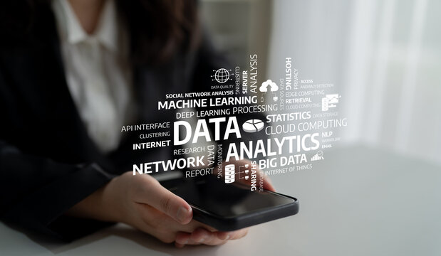 A professional woman holds a smartphone, surrounded by keywords related to data analytics, portraying the intersection of technology and business in modern environments. Tessel - Powered by Adobe