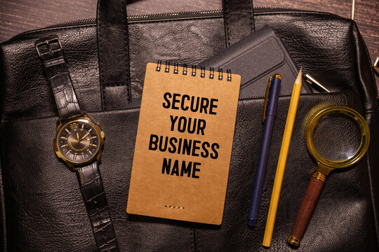 Handwritten text SECURE YOUR BUSINESS NAME, business success concept