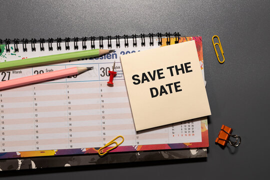 SAVE THE DATE Businessman work on tablet on screen.