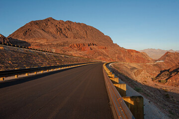 sunset highway in the desert red rock