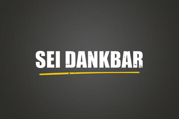 Sei dankbar (Be grateful) - A blackboard with white text.