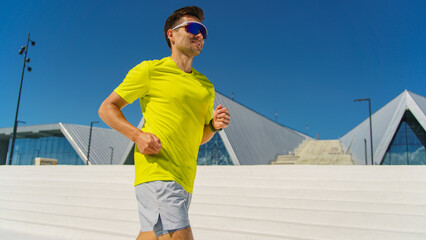 Runner in bright shirt enjoys outdoor exercise session