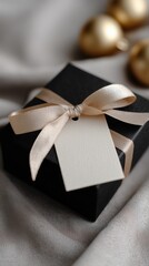 A stylishly wrapped present for a celebration, featuring a satin bow and a customizable label for personalized holiday or wedding messages.