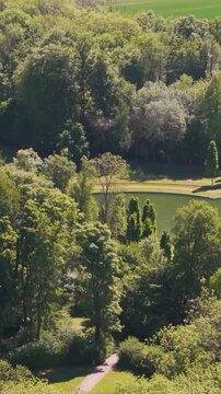 glides grounds ch&acirc;teau seneffe large water filled pond people camping park adds lively touch serene to revealing backside aerial drone of de belgium 