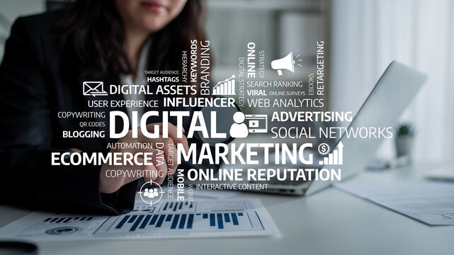 A businesswoman works on her laptop with digital marketing terms prominently displayed, illustrating the modern landscape of advertising and online presence strategies. Tessel