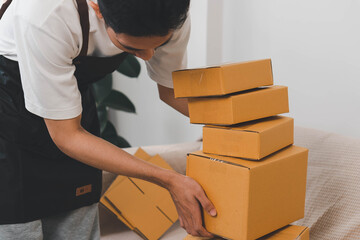 Close-up of man holding a parcel box, representing delivery service, shipping, e-commerce...