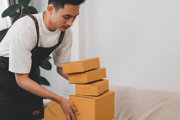 Close-up of man holding a parcel box, representing delivery service, shipping, e-commerce...