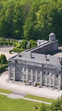 main part ch&acirc;teau seneffe green parks behind visitors walking building along visible parking illustrate to left toward right front pans aerial of de 