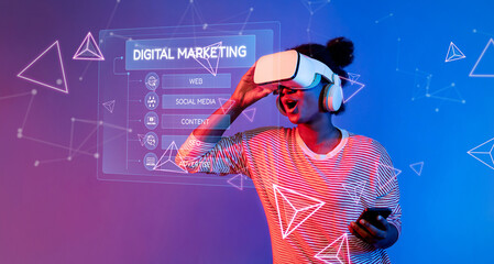 A woman immerses herself in digital marketing strategies using a VR headset, surrounded by vibrant graphics that represent the intersection of technology and creativity. XDMCP