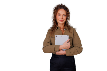 Confident businesswoman holding tablet, looking at camera, representing professionalism, modern technology, and leadership on transparent background