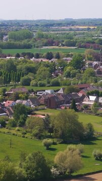 above seneffe town charming houses green cover below scenic town's inviting atmosphere making picturesque location revealing circles aerial drone view belgium lush 