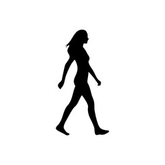 Silhouette of a woman walking with her head turned to the side and her arms swinging freely in the air