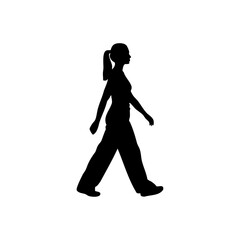 Silhouette of a woman walking with a ponytail wearing pants and a shirt in a black and white image