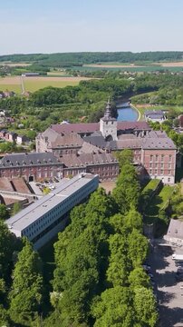 town below parked cars main building floreffe abbey belgium perspective area's layout to from left right wide view abbaye de 