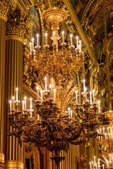 Obraz premium Ceiling lamps and architectural elements eclectic Beaux-Arts style of Second Empire in France, elements of neo-baroque, classicism and Roman architecture, golden stucco, rich decoration