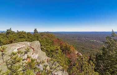 Fototapeta premium Minnewaska State Park NY overlook via Millbrook Mountain carriage road on a bright fall afternoon