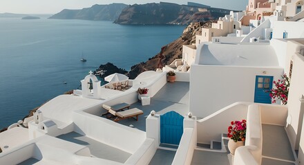 Iconic Santorini Whitewashed Village Clinging to Volcanic Cliffs Overlooking Aegean Sea.
