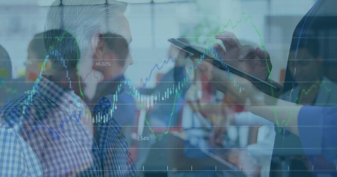 Tapping tablet screen, right-side person wearing business attire at meeting with financial charts - Powered by Adobe