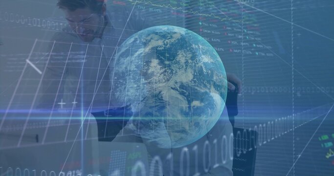 Floating holographic Earth globe superimposing over modern office workspace, with financial charts