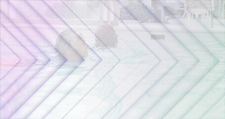 Floating senior woman and man chatting in pool wearing swimwear near lounge chairs, chevron overlay