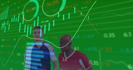 Standing pair in blue and red jerseys facing studio candlestick charts projecting across torsos